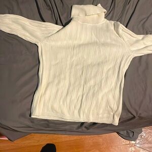 A cleaned white turtle neck for special occasions (iron it), has good quality!
